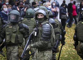 As Belarus votes in tightly controlled elections, its leader accuses the West of fueling unrest