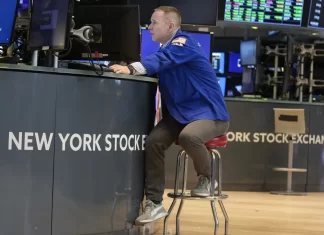 Stock market today: Wall Street holds relatively steady near record highs