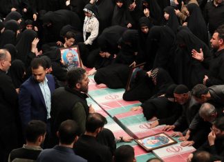 Iran holds funeral for officers killed in embassy strike