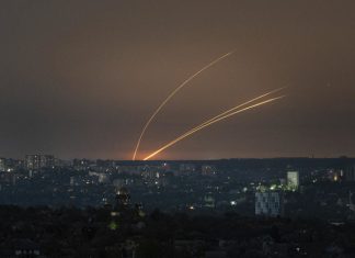 Moscow says 50 Ukrainian drones shot down as attacks spark fires at Russian power stations