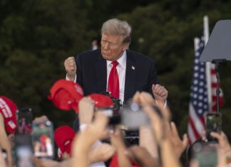 Trump, without evidence, claims migrants in US illegally ‘building army’ to attack Americans