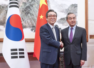 China warns South Korea about closer ties with U.S., Japan