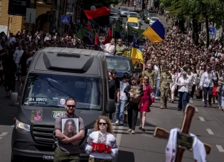 Nearly 1,000 people honor a young Ukrainian journalist and volunteer combat medic killed in action