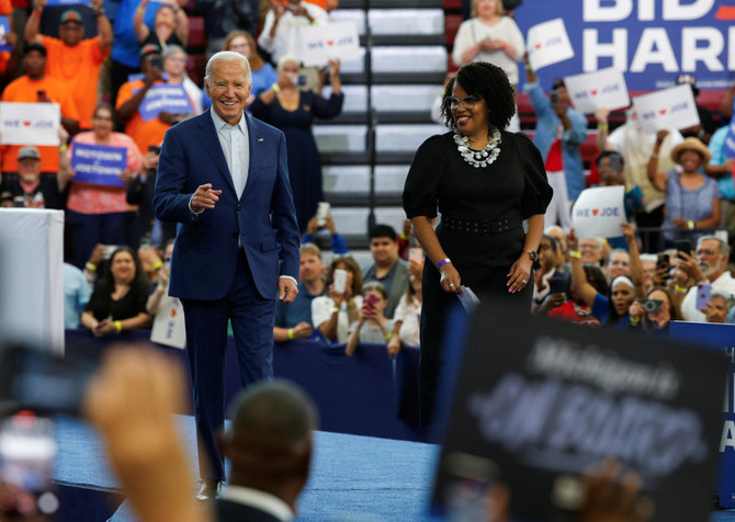 U.S. President Joe Biden walks on stage at a campaign stop at Renaissance High School in Detroit