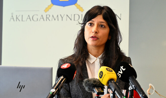 Prosecutor Reena Devgun speaks during a press conference, in Stockholm