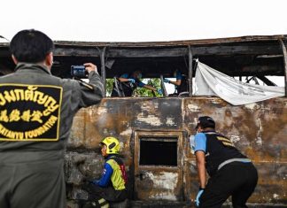 Thai police arrest driver and work to identify victims of the school bus fire that killed 23