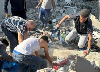 Israeli airstrikes kill at least 30 Palestinians in Gaza, medics say