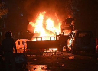 India orders curfew after violence over tomb of 17th-century Muslim ruler