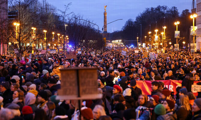 Protest against chancellor candidate Merz's plans to limit migration, in Berlin