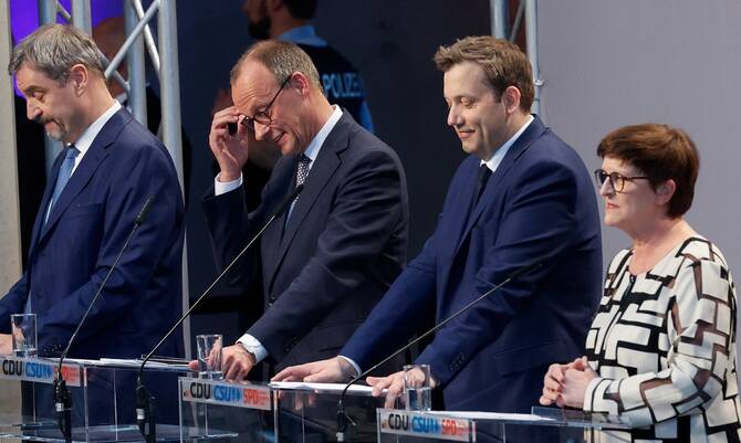 afp_20250409_39pk9zp_v1_preview_germanypoliticscoalition