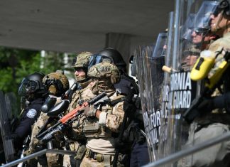 US defense department draws up rules on possible use of force by Marines deployed to LA protests