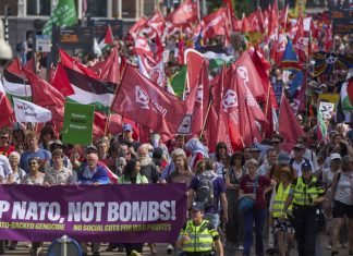 Hundreds protest in The Hague against NATO, days before the Dutch city hosts alliance summit