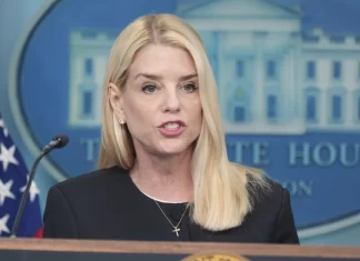 2 Chinese nationals charged with spying inside the US for Beijing, Justice Department says