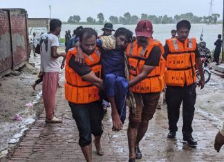 Pakistan evacuates thousands as India releases water from overflowing dams, swollen rivers