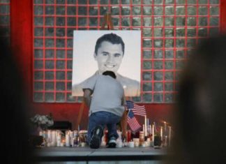 A 22-year-old Utah man is in custody in Charlie Kirk shooting, AP source says