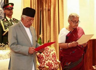 Nepal returns to calm as first woman PM takes charge
