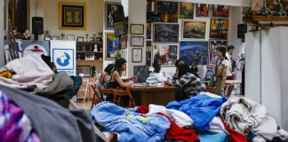 Riot at Greek migrant detention center leaves 2 police injured, 30 migrants arrested