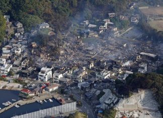 Fire burning in southwestern Japan damages 170 homes and forces evacuations