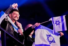 Despite anti-Israel chants in arena, Israel’s Noam Bettan advances to Eurovision final