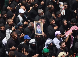 Iran warns US, Israel against attacks ahead of long-delayed Khamenei funeral