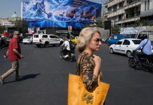 Iran hesitant to enforce mandatory headscarf law as war and economic pressures mount