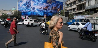 Iran hesitant to enforce mandatory headscarf law as war and economic pressures mount