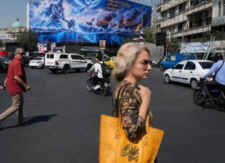 Iran hesitant to enforce mandatory headscarf law as war and economic pressures mount